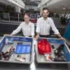 Get Through Security Quickly Airport Security Screening Officers, Michelle Halpin and Sergio Rocha with a sample of what passengers should place in the trays at security screening. Photo: Dublin Airport